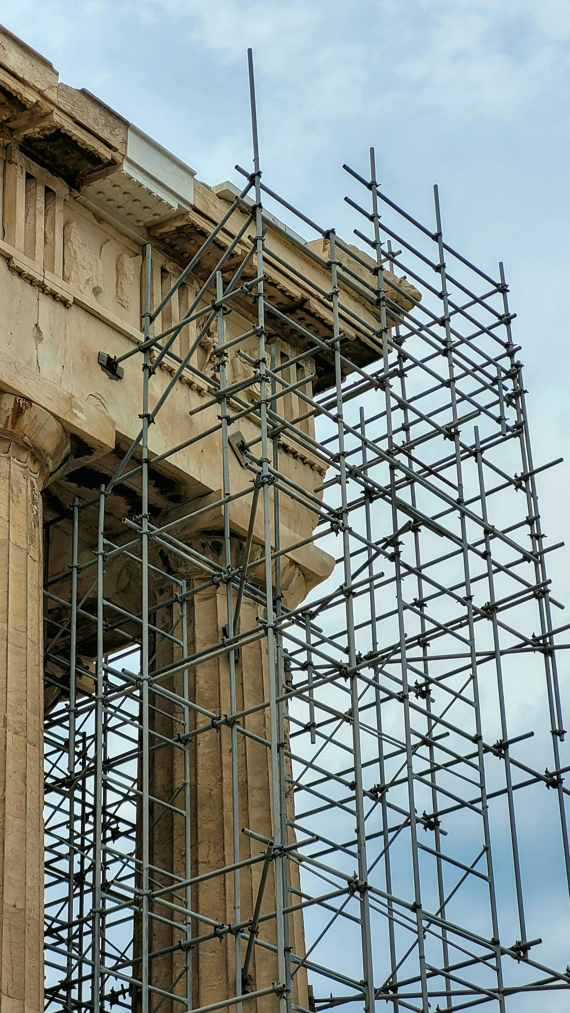 a clock tower with scaffolding around it